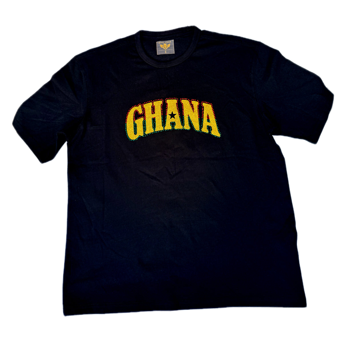 A black short-sleeve t-shirt with 'GHANA' printed across the chest in yellow and red gradient block letters, displayed flat against a white background.